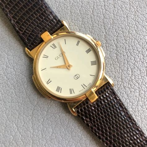 gucci 18k gold watch|gucci watch gold detailing.